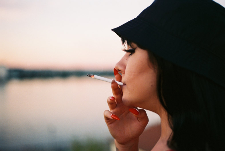 woman smoking classic cigarette