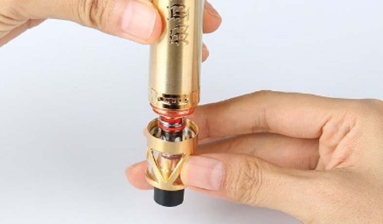 Person who takes apart the electronic cigarette before disinfecting it