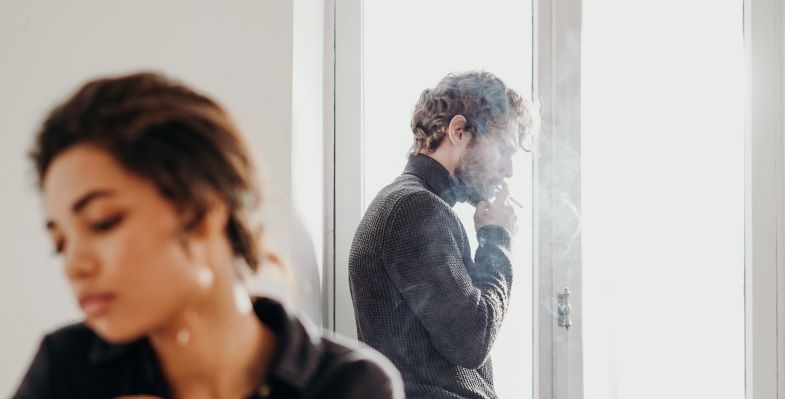 Woman annoyed by second-hand smoke