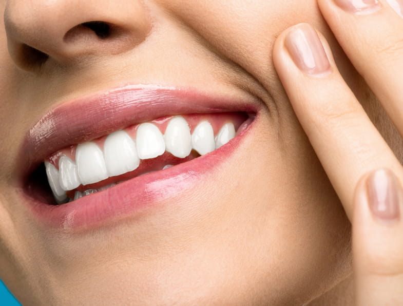 Healthy white smile of a non-smoking woman