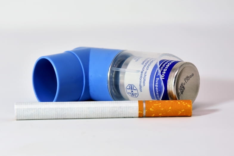 Inhaler for asthmatics next to a traditional cigarette | Terpy 