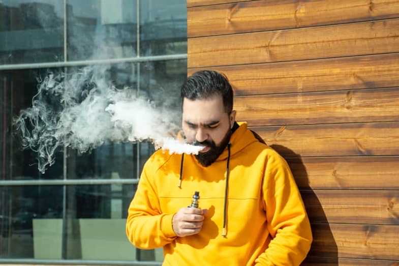 Man leaning against a wall vaping | Terpy 